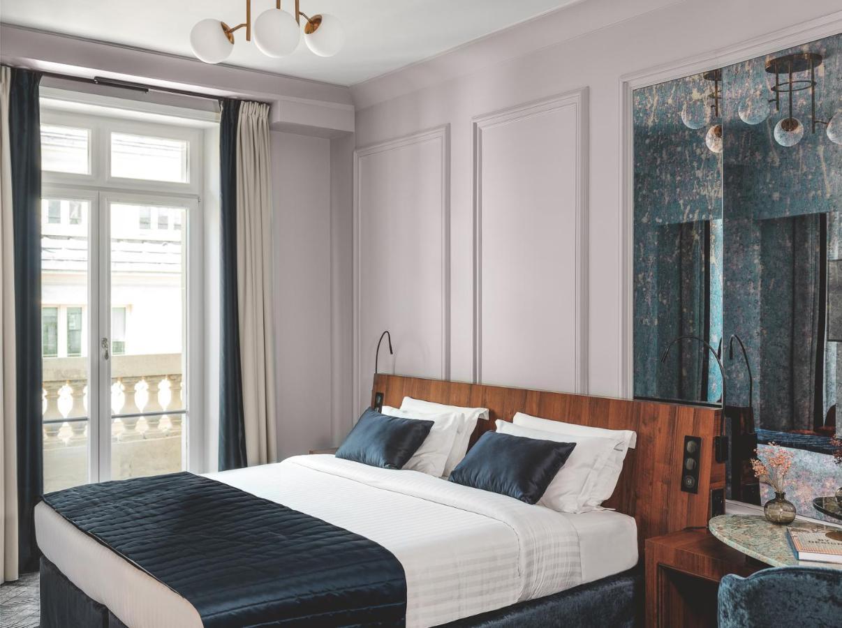Signature Kamer met Balkon en 1 Queensize Bed